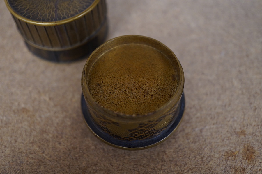 A Japanese miniature cylindrical lacquer box, 19th century, with applied carved ivory flower, 4.5cm in diameter. Condition - one interior section missing CITES Submission reference Z9FUK266